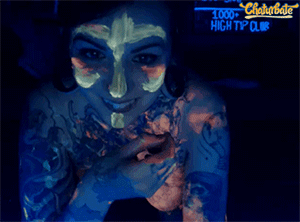 Sex-crazy cam girl harliequinnx covered with fluorescent paint
